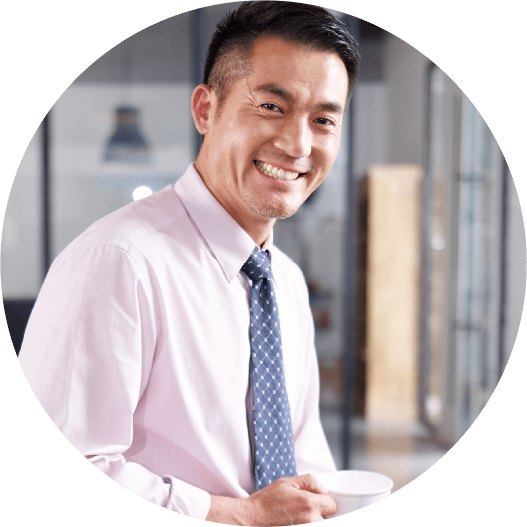 Smiling businessman on cell phone